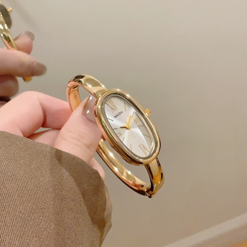 Ladies Luxury Watch - ハイエンドの女性用ローマスケールクォーツ時計シンプルなゴールドブレスレットレディースウォッチオーバルダイヤル腕時計時計ドレスモントレファム